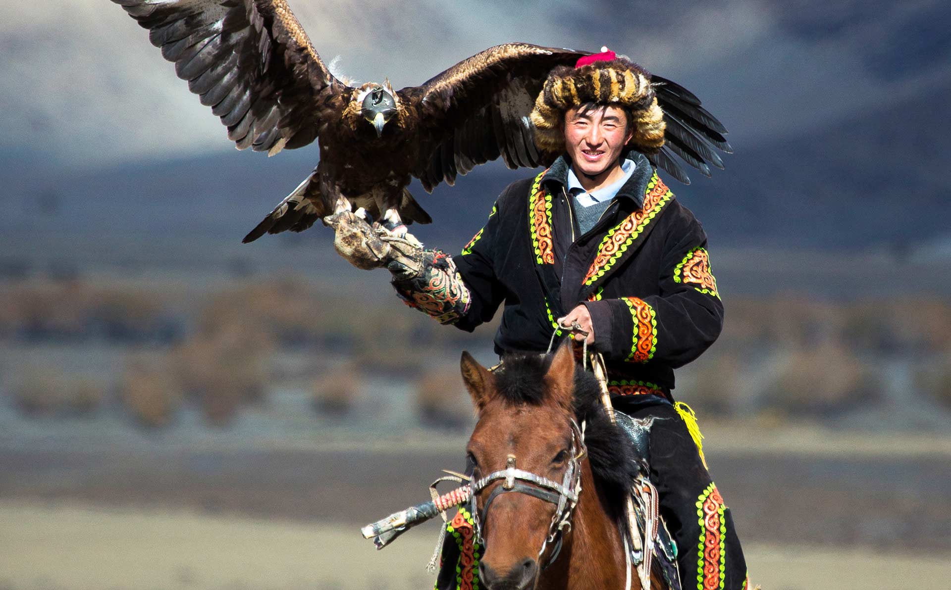 Kazakh Eagle Hunter in traditional clothing.