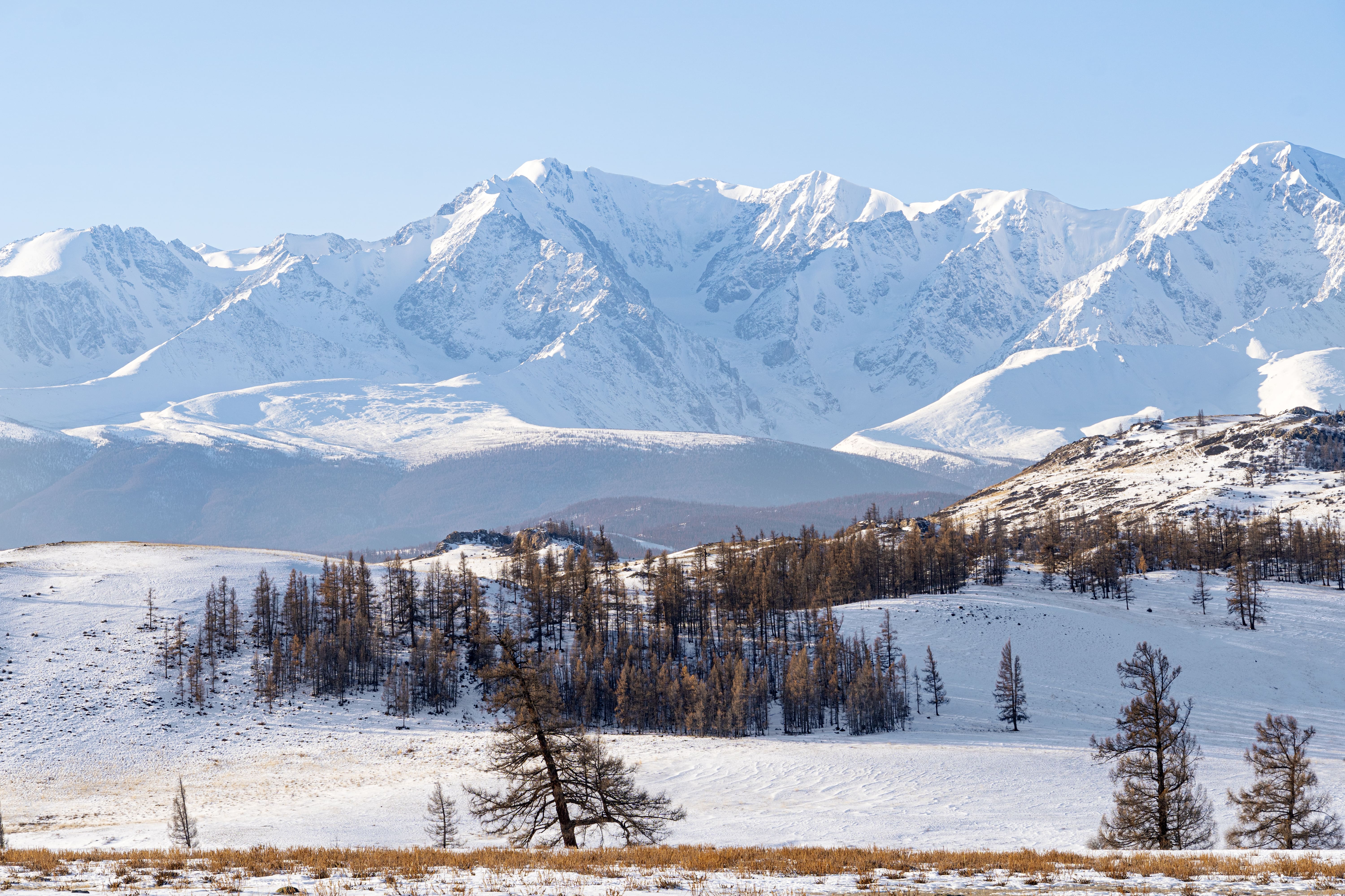 beautiful-snowy-landscape-with-mountains-background-steppe-landscape-altai-mountains-mongolia-min.jpg